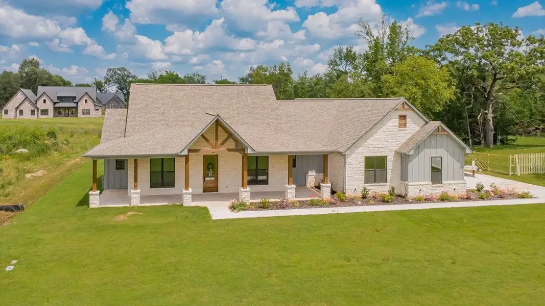 Front exterior of a new home in , Tyler, TX, highlighting curb appeal (Image 25).