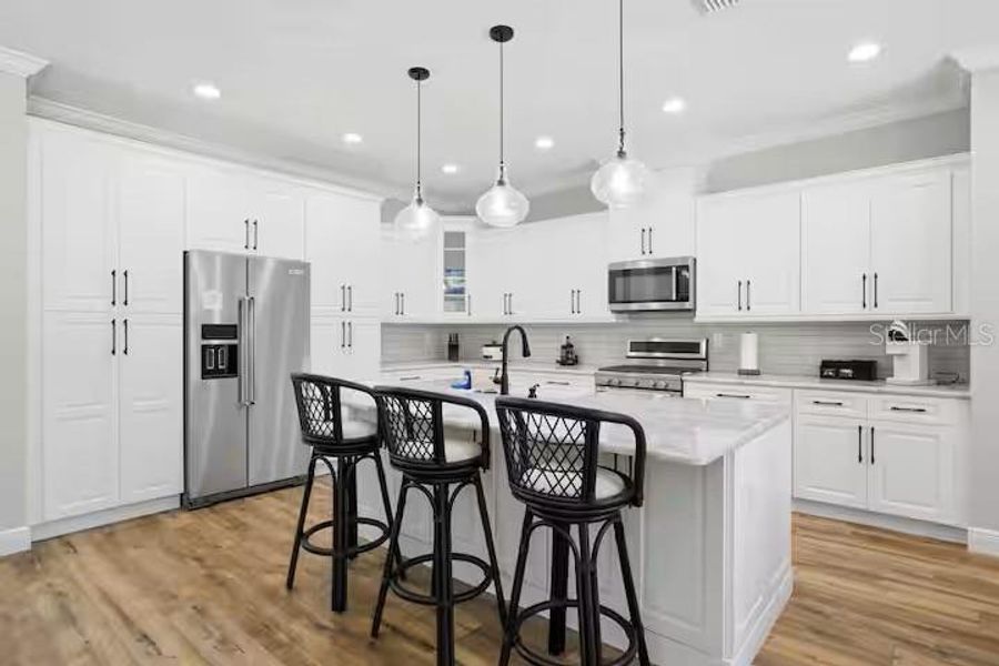 Furnished interior view inside a new home in , Dunnellon (Image 7).