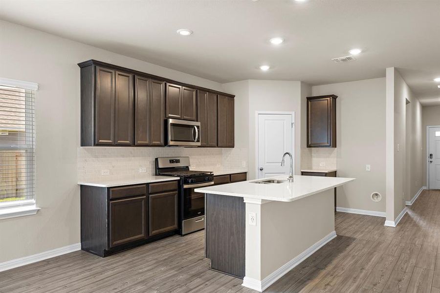 42" kitchen cabinets and white quartz countertops