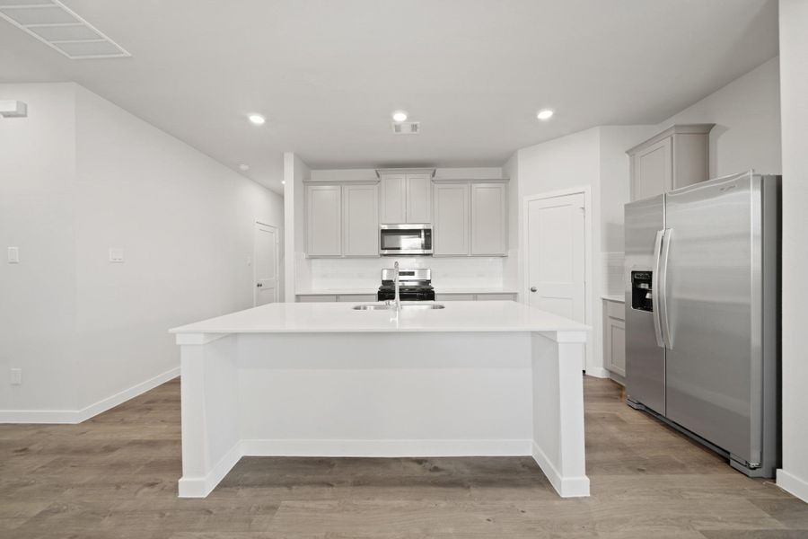 Furnished interior view inside a new home in Russell Ranch, Bay City (Image 4).