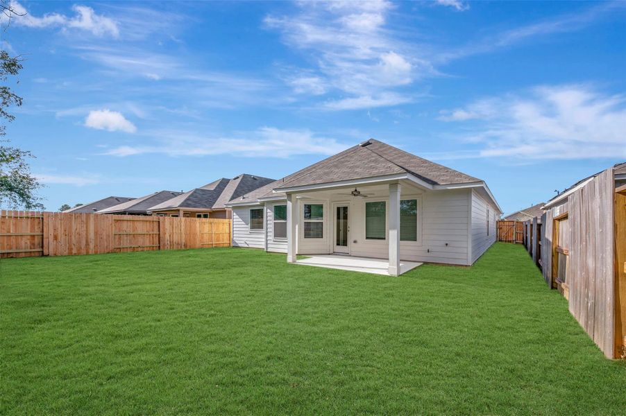 Exterior details and patio area of a home in Moran Ranch, Willis (Image 4).