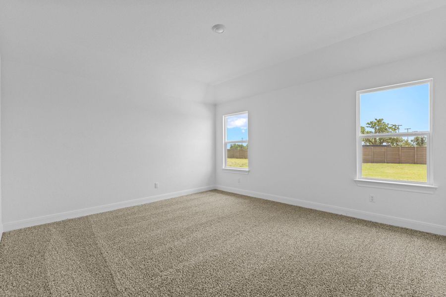 Spacious, unfurnished interior of a new home in Railhead, Cedar Creek (Image 27).