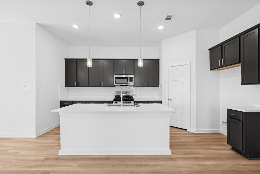 Furnished interior view inside a new home in Pinewood at Grand Texas, New Caney (Image 6).