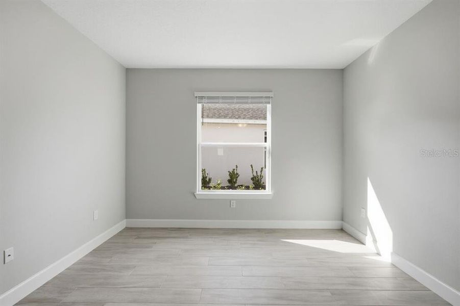 Spacious, unfurnished interior of a new home in Esplanade at Westview, Kissimmee (Image 25).