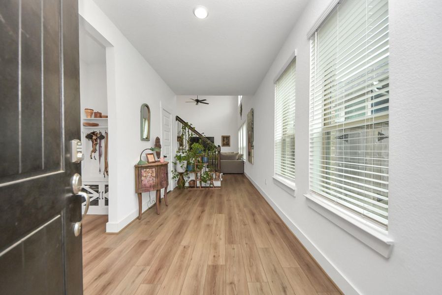 Bright, welcoming entry that opens beautifully into the main living space.