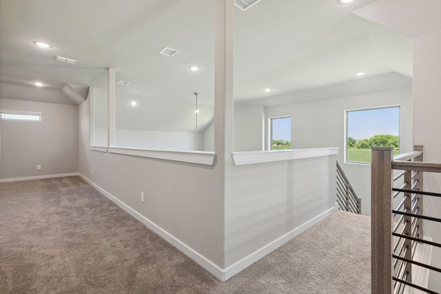 Upstairs in the Henley home plan by Trophy Signature Homes – REPRESENTATIVE PHOTO