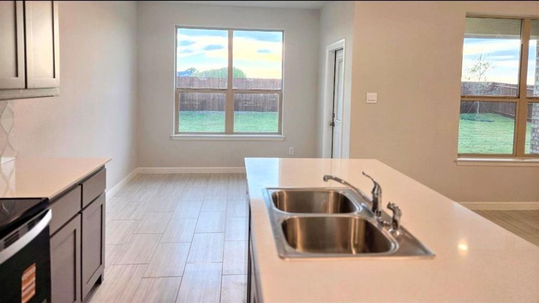 Kitchen - All Home and community information, including pricing, included features, terms, availability and amenities, are subject to change at any time without notice or obligation. All Drawings, pictures, photographs, video, square footages, floor plans, elevations, features, colors and sizes are approximate for illustration purposes only and will vary from the homes as built. Kitchen - All Home and community information, including pricing, included features, terms, availability and amenities, are subject to change at any time without notice or obligation. All Drawings, pictures, photographs, video, square footages, floor plans, elevations, features, colors and sizes are approximate for illustration purposes only and will vary from the homes as built.