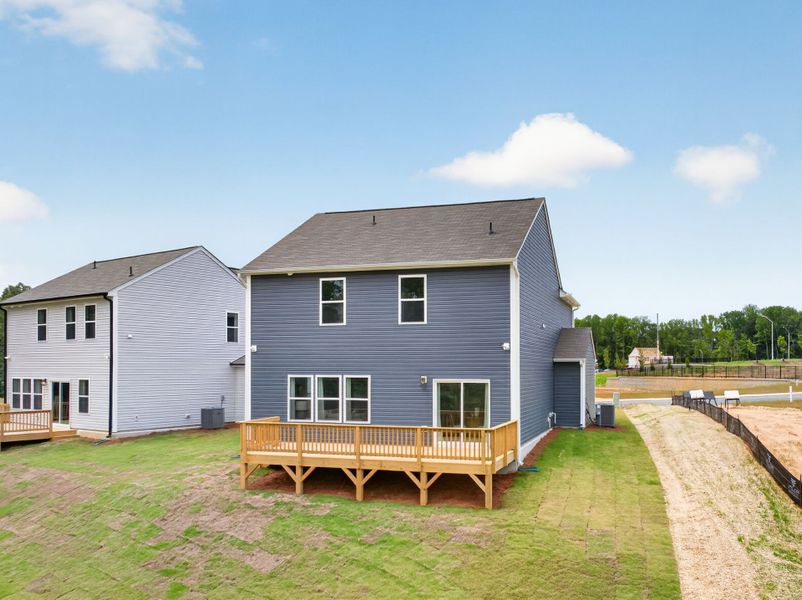 Exterior details and patio area of a home in White Oak Creek Crossing, Angier (Image 25).