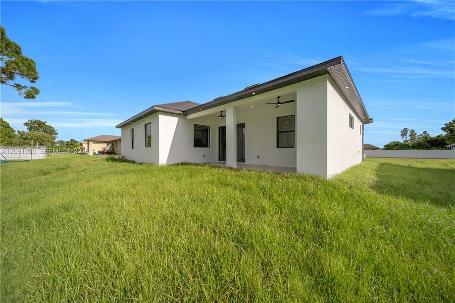Exterior details and patio area of a home in , Lehigh Acres (Image 29). Exterior details and patio area of a home in , Lehigh Acres (Image 29).