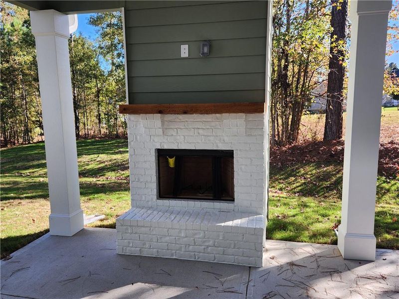 Exterior details and patio area of a home in The Woodlands Preserve, Jackson (Image 3).