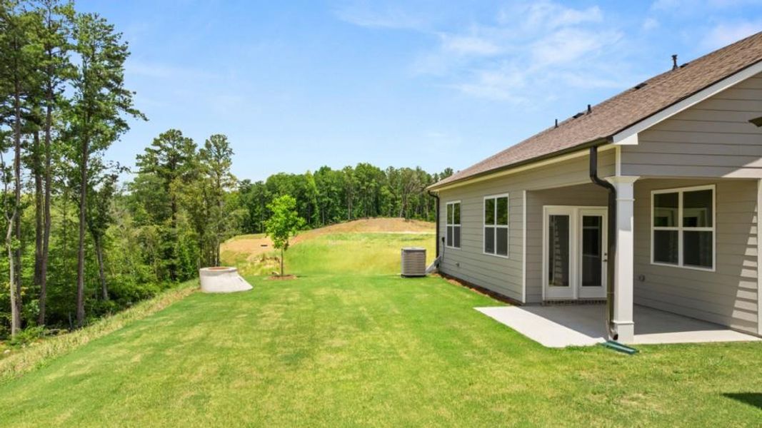 Exterior details and patio area of a home in Hamptons at Riverwood North, Dallas (Image 3).