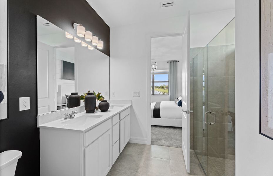 Relaxing owner's bathroom with oversized shower with glass enclosure Relaxing owner's bathroom with oversized shower with glass enclosure