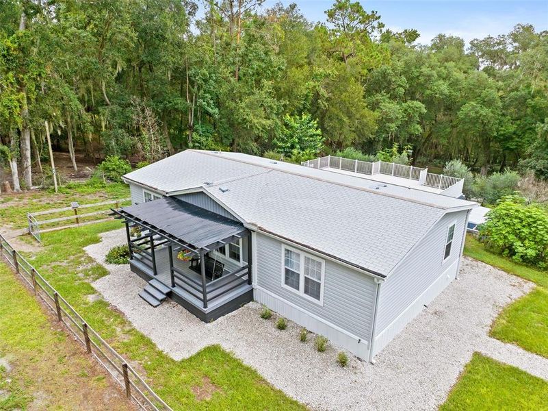Exterior details and patio area of a home in , Brooksville (Image 32).