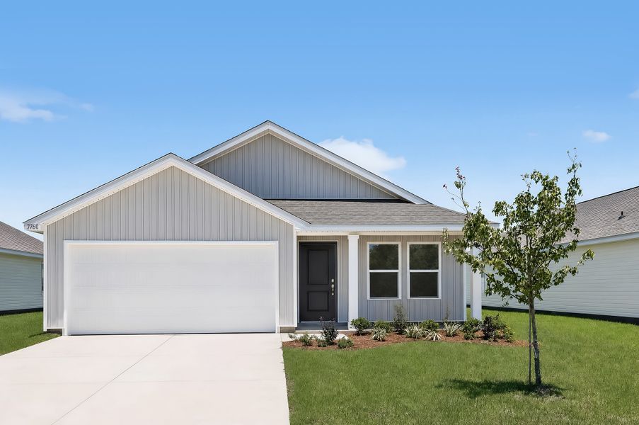 Front exterior of a new home in Horizon's Edge, Milton, FL, highlighting curb appeal (Image 1). Front exterior of a new home in Horizon's Edge, Milton, FL, highlighting curb appeal (Image 1).