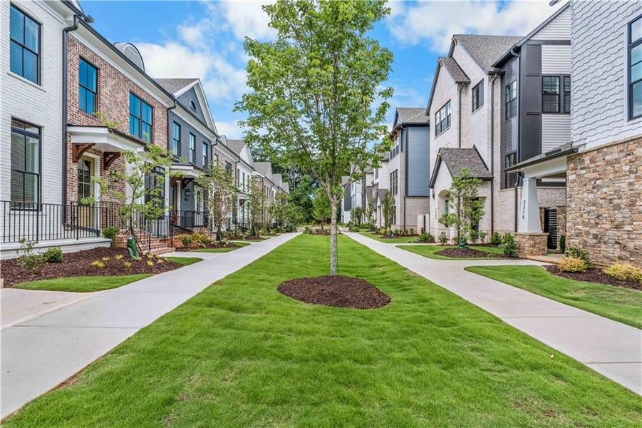 THE INTERIOR "MEWS" OR PARK AREA IS SO TRANQUIL YOU CAN ALMOST FORGET YOU ARE IN THE MIDDLE OF DOWNTOWN ALPHARETTA THE INTERIOR "MEWS" OR PARK AREA IS SO TRANQUIL YOU CAN ALMOST FORGET YOU ARE IN THE MIDDLE OF DOWNTOWN ALPHARETTA
