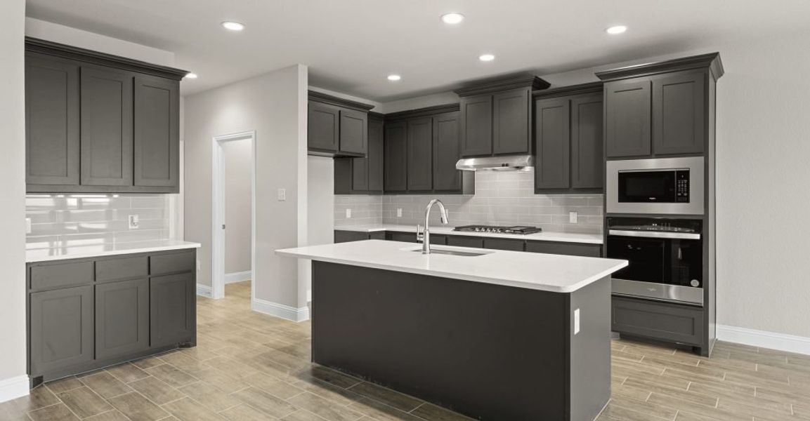 Representative exterior photo of a completed home built from the Donnington by Impression Homes in Still Water Lake, Godley, TX (Image 5).