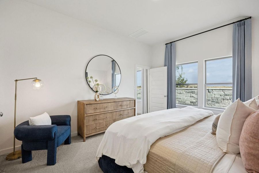 Primary Bedroom in the Diamond home plan by Trophy Signature Homes – REPRESENTATIVE PHOTO