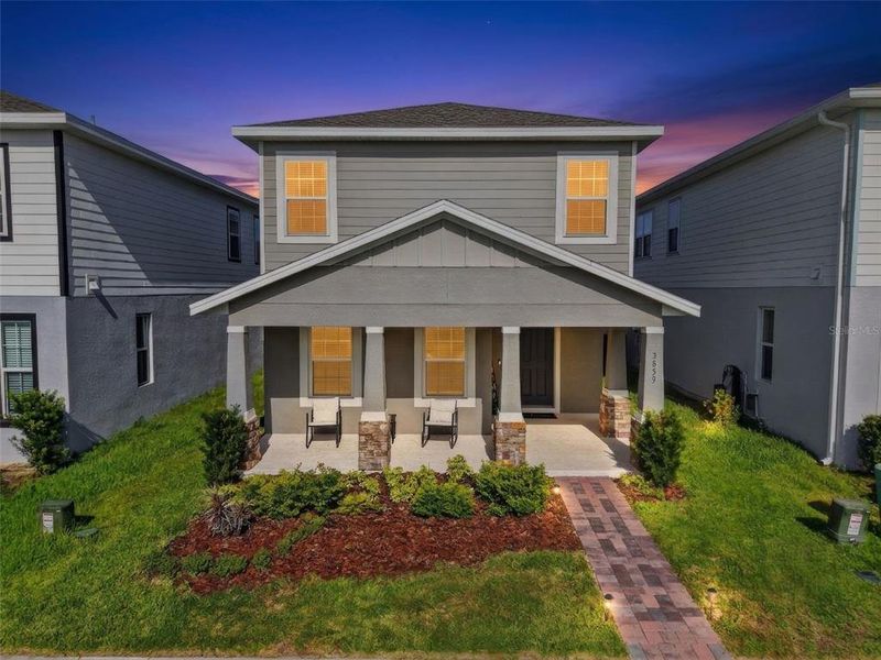 Front exterior of a new home in , Apopka, FL, highlighting curb appeal (Image 24).