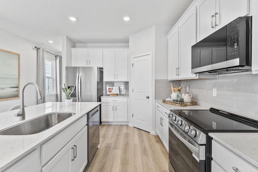 Laurel II Floor Plan Chef's Kitchen with LG Appliances at The Preserve at Camden Woods