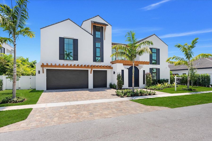 Front exterior of a new home in , Boca Raton, FL, highlighting curb appeal (Image 27). Front exterior of a new home in , Boca Raton, FL, highlighting curb appeal (Image 27).