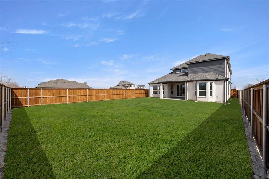 Exterior details and patio area of a home in Inspiration, Lucas (Image 26).