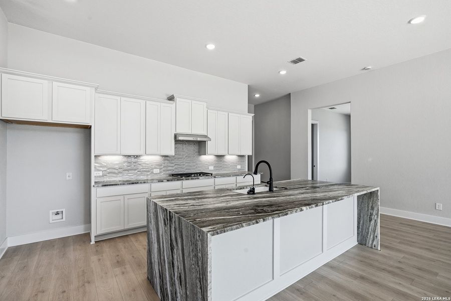 Furnished interior view inside a new home in Potranco Oaks, Castroville (Image 12).