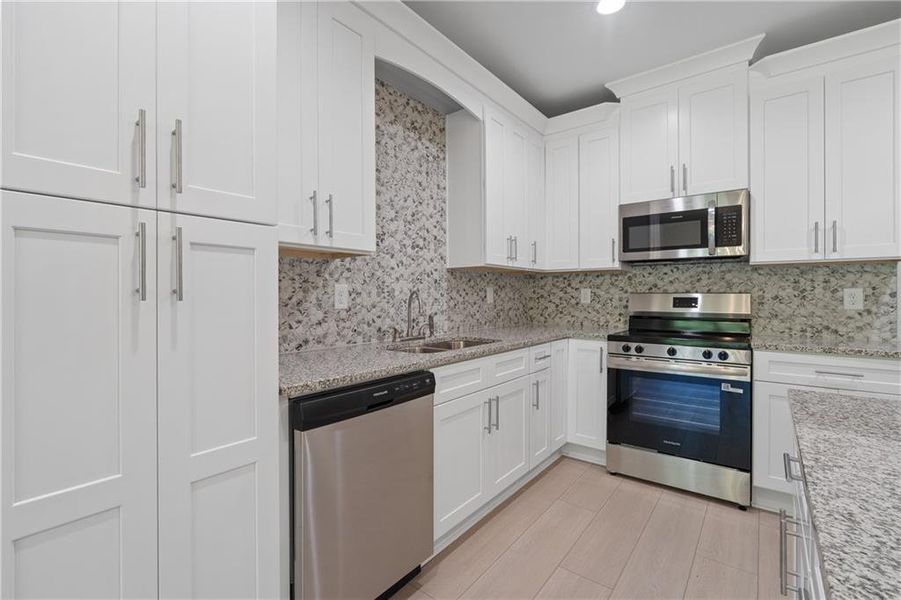 Furnished interior view inside a new home in , Gray (Image 13).