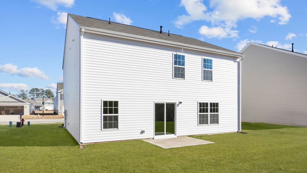 Exterior details and patio area of a home in Madeline Farm, New Bern (Image 25).