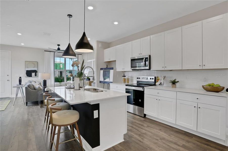 Furnished interior view inside a new home in Serenade at Ovation, Winter Garden (Image 8).