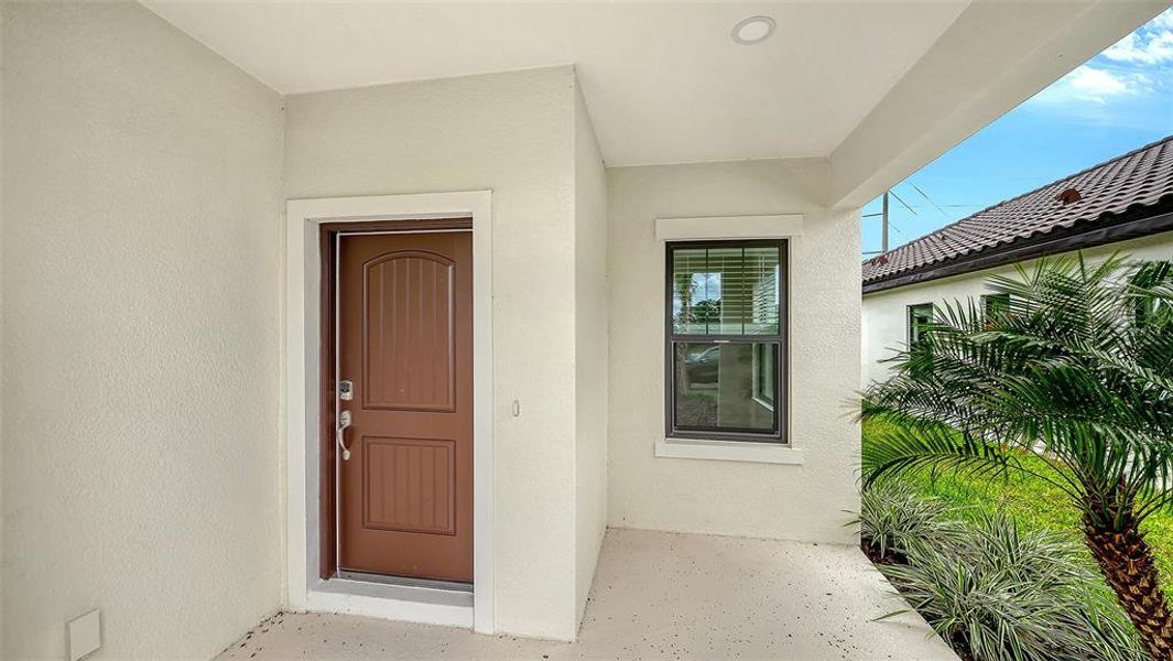 Exterior details and patio area of a home in Vicenza Real Estate and Homes for Sale in North Venice, FL - Neal Communities, Nokomis (Image 19). Exterior details and patio area of a home in Vicenza Real Estate and Homes for Sale in North Venice, FL - Neal Communities, Nokomis (Image 19).