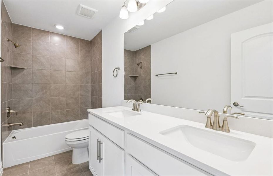 Spacious secondary bathroom with double vanity Spacious secondary bathroom with double vanity