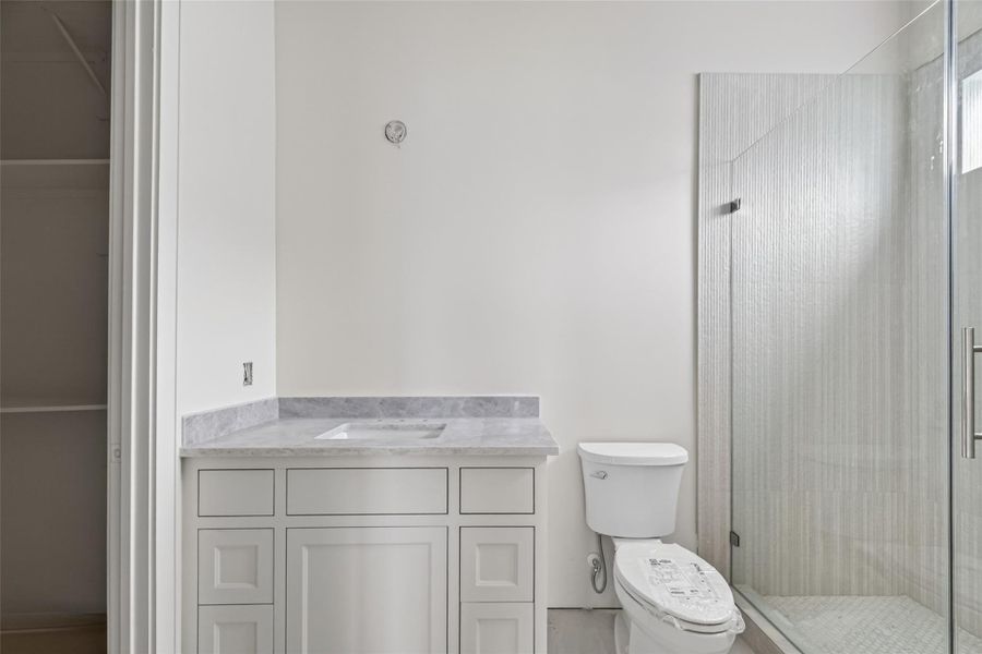 One of many secondary bathrooms