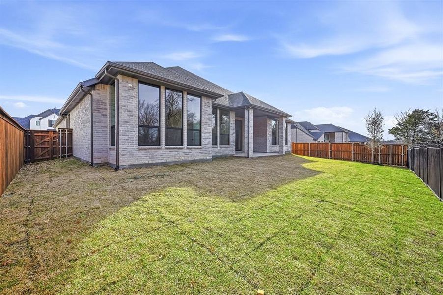 Exterior details and patio area of a home in Mustang Lakes, Celina (Image 2).