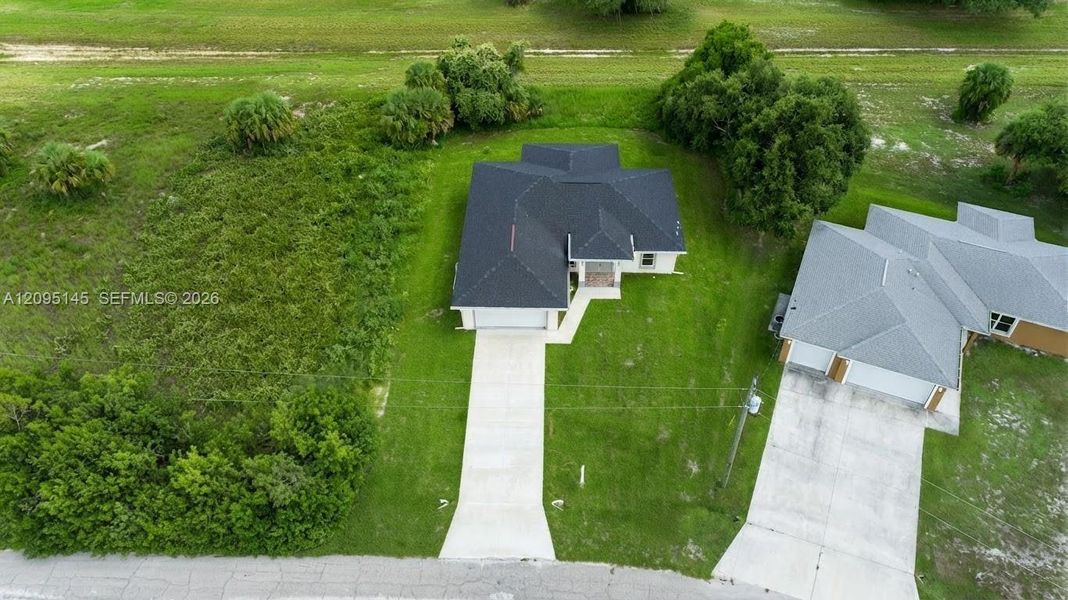 Front exterior of a new home in , Labelle, FL, highlighting curb appeal (Image 21). Front exterior of a new home in , Labelle, FL, highlighting curb appeal (Image 21).