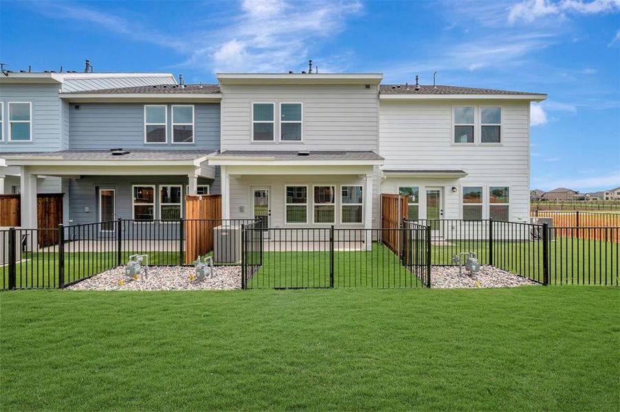 Exterior details and patio area of a home in Providence Commons, Providence Village (Image 3).