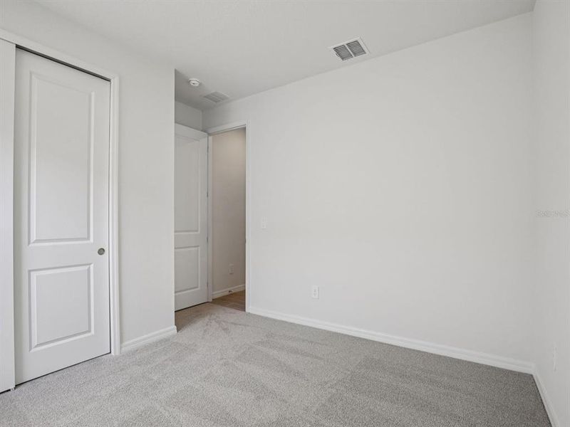 Spacious, unfurnished interior of a new home in Coasterra - Reserve Series, Palmetto (Image 21).