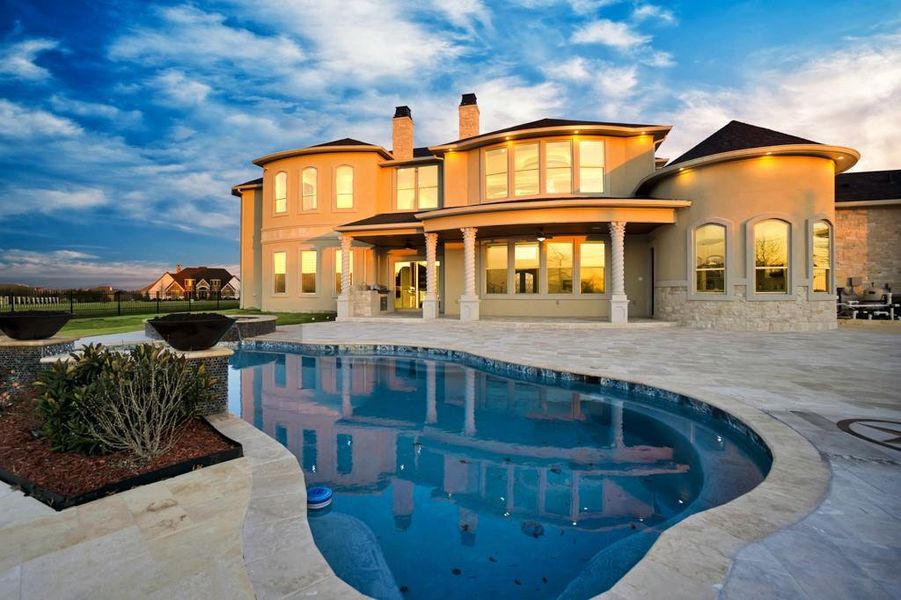 Rear view of house with a patio