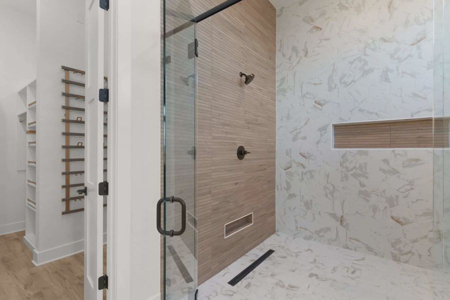 Image 15 representing the Merritt by Chesmar Homes in Feathergrass, Fulshear, TX.