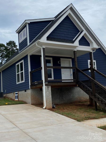 FRONT/LEFT SIDE OF HOUSE