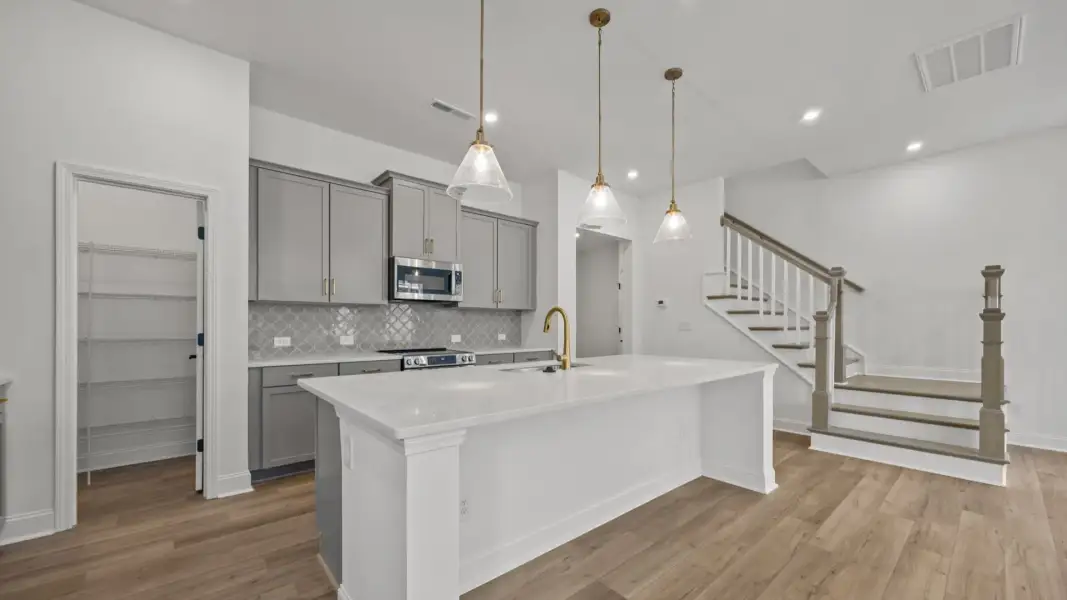 The Brentwood Plan by DRB Homes in River District, Charlotte NC.- Kitchen