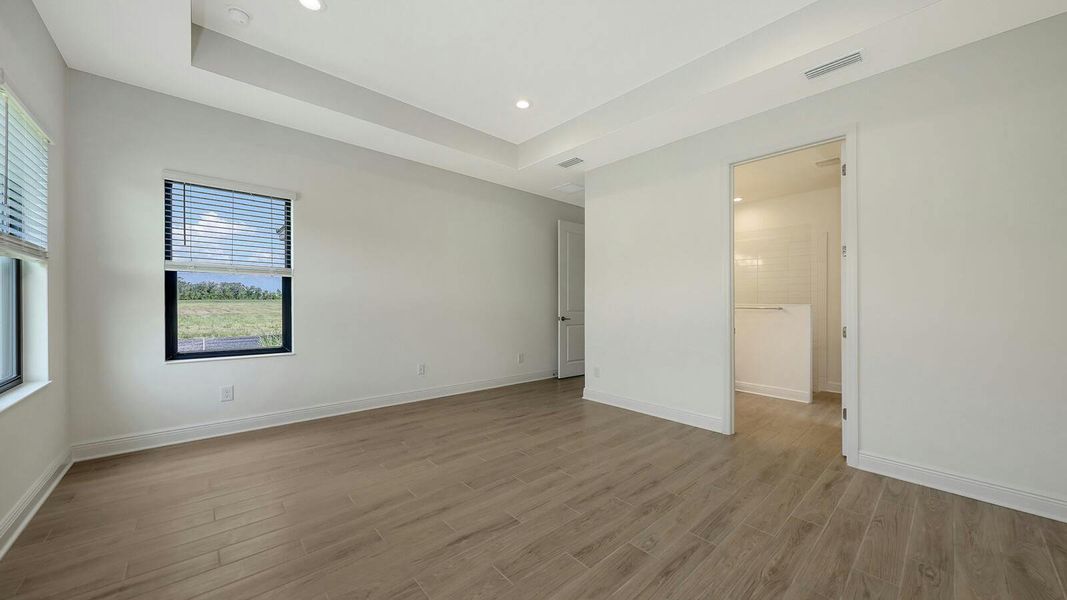 Spacious, unfurnished interior of a new home in Palm Grove Real Estate and Homes for Sale in Lakewood Ranch, FL - Neal Communities, Lakewood Ranch (Image 52).
