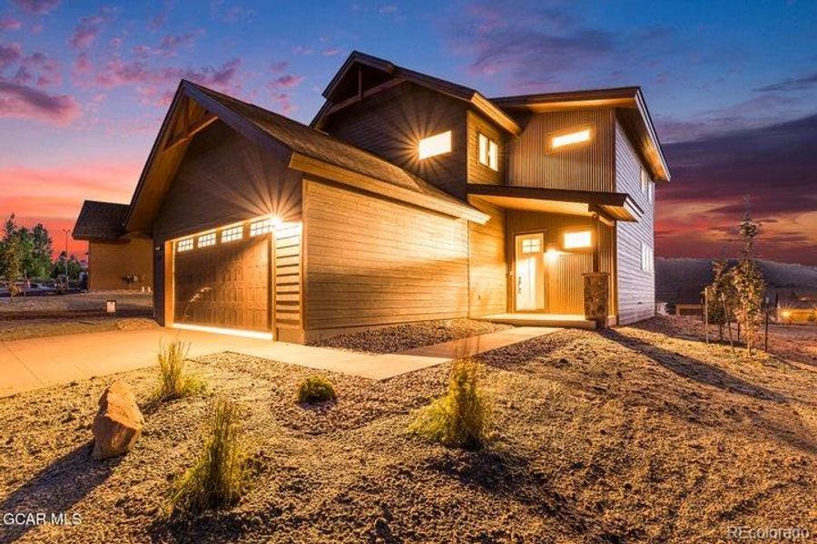 Front exterior of a new home in , Granby, CO, highlighting curb appeal (Image 20).