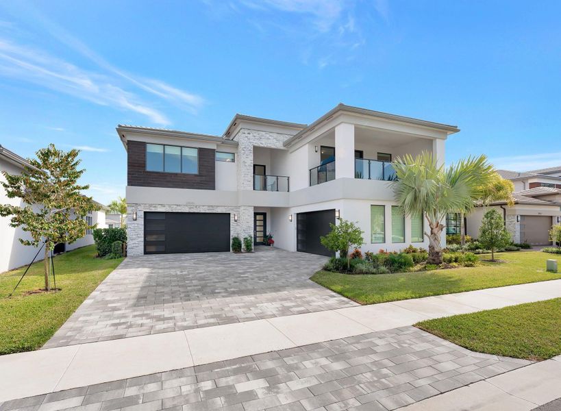 Front exterior of a new home in , Boca Raton, FL, highlighting curb appeal (Image 29). Front exterior of a new home in , Boca Raton, FL, highlighting curb appeal (Image 29).