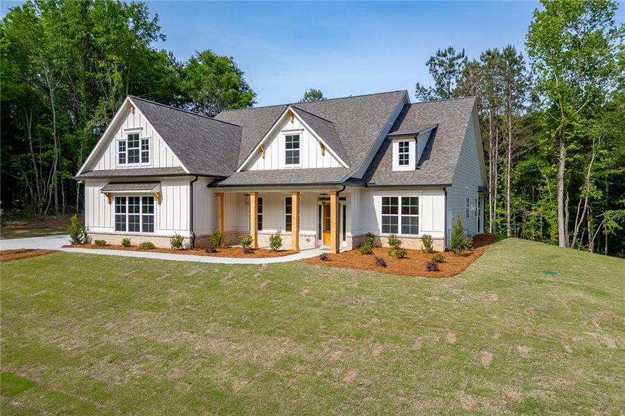 Front exterior of a new home in , Winder, GA, highlighting curb appeal (Image 24).
