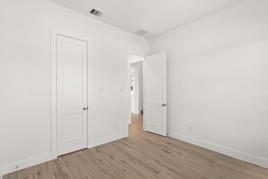 Spacious, unfurnished interior of a new home in The Highlands, Porter (Image 31).