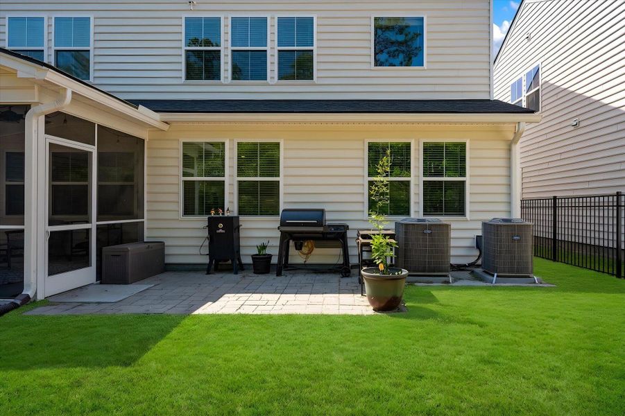 Exterior details and patio area of a home in , Johns Island (Image 26).