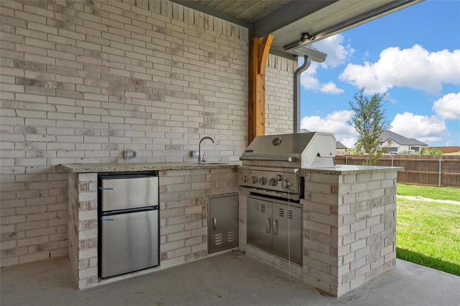 Exterior details and patio area of a home in , Hewitt (Image 28).