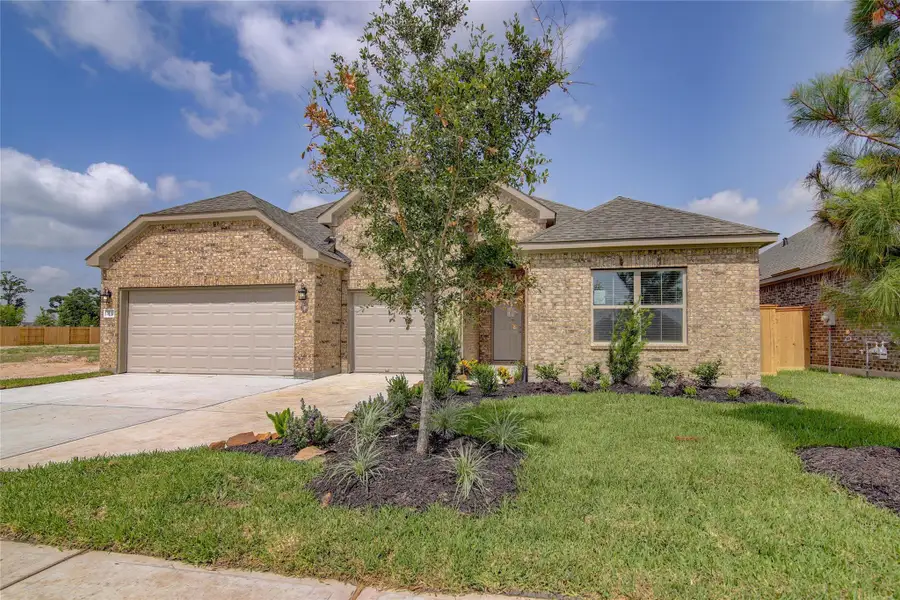 Front exterior of a new home in Rates starting as low as, Iowa Colony, TX, highlighting curb appeal (Image 21).