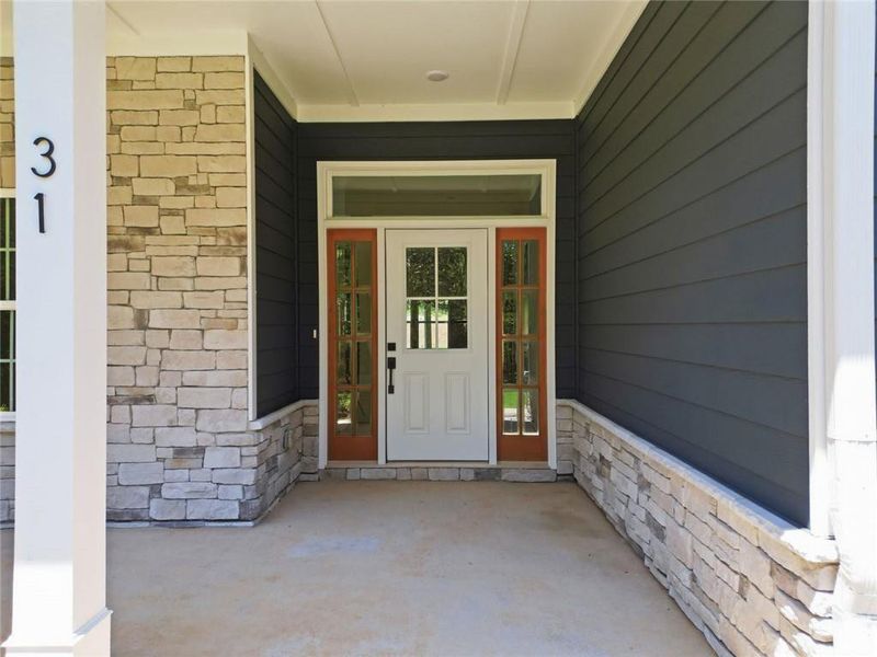 Exterior details and patio area of a home in , White (Image 23).