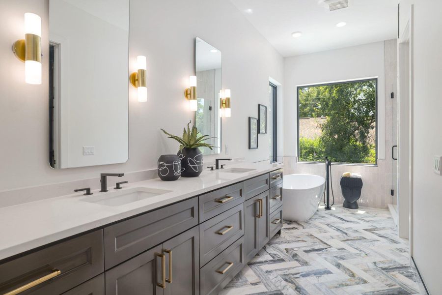 Dual vanity with matte black fixtures and brass accents